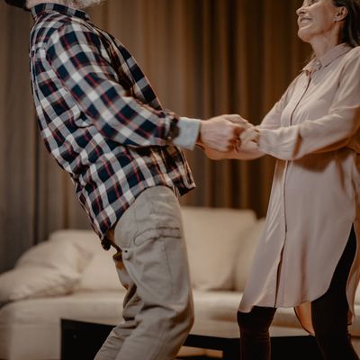 Portrait of Olha Zarichna, a yoga instructor, smiling warmly.